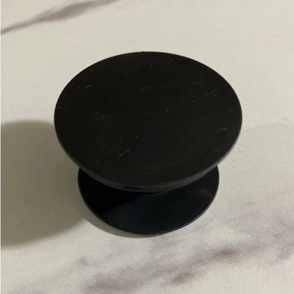 Sleek Black Phone Grip